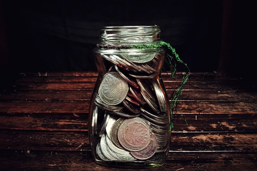 clear glass jar on brown wooden table
